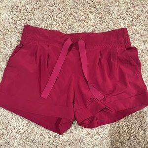 Red Lululemon shorts